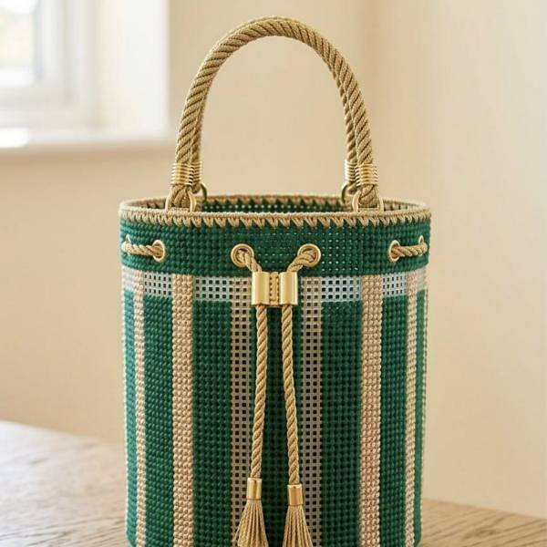 Striped bucket bag in green and gold